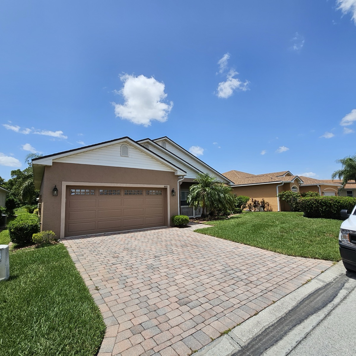 Before and after roof repair on a Davenport home