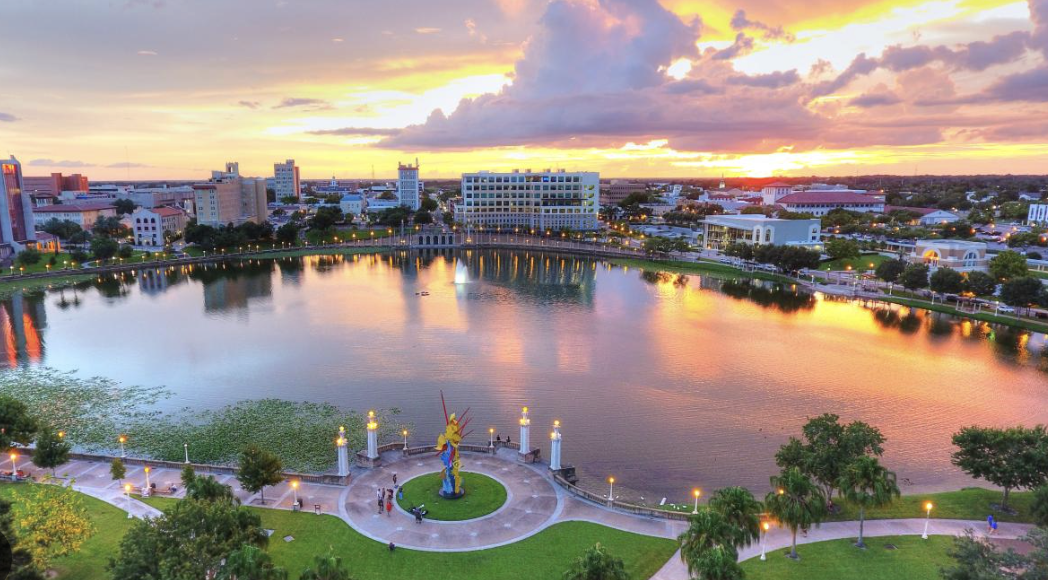 Winter Haven FL skyline at sunset over Chain of Lakes